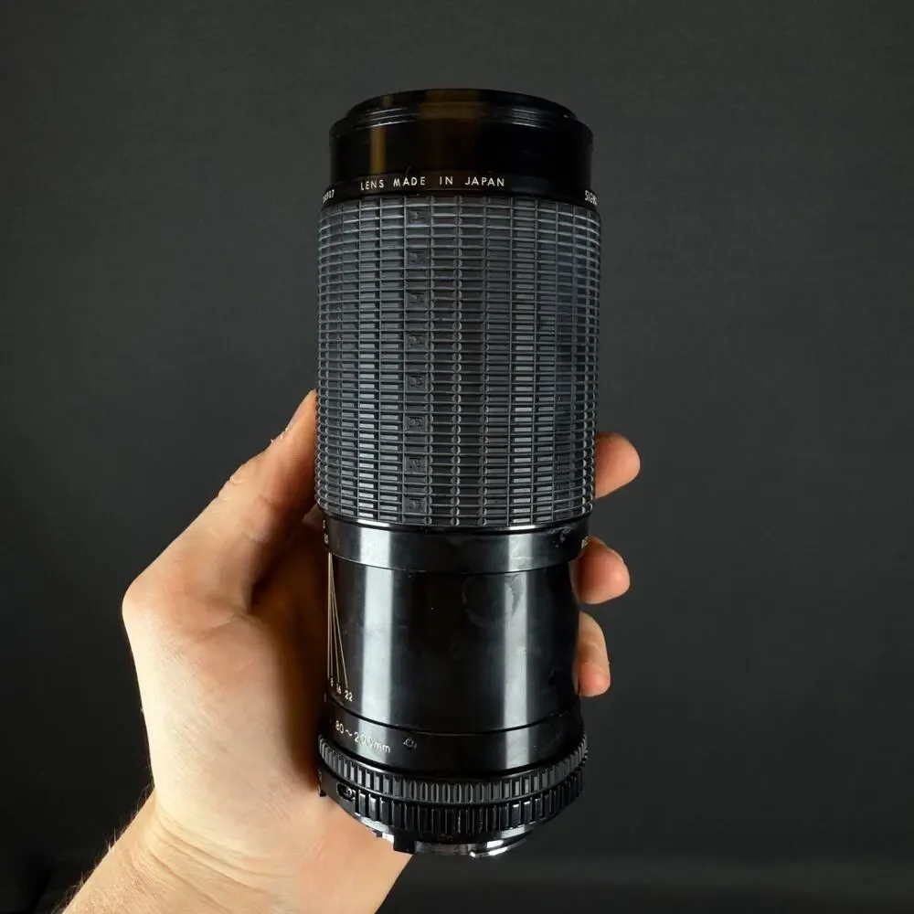 Sigma High-Speed Zoom-C 80-200mm 3.5-4 with case and lenses